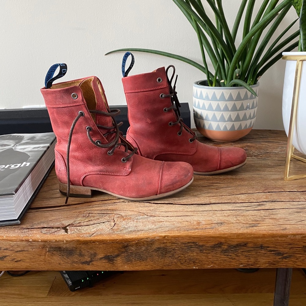John Fluevog red lace up boots.